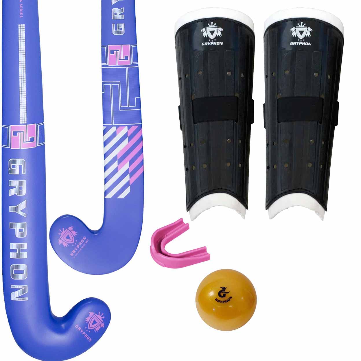 A field hockey kit including two blue and purple GRYPHON brand hockey sticks, black shin guards with white trim, a pink mouthguard, and a yellow hockey ball on a white background.