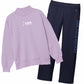 A two-piece sports outfit set featuring a light purple sweatshirt and navy blue sweatpants. The sweatshirt has a white USA Field Hockey logo on the left chest, and the sweatpants feature 'USA FIELD HOCKEY' printed vertically in light blue on the right leg.