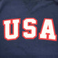 Front details on the blue USA Field Hockey Tackle Twill Crewneck