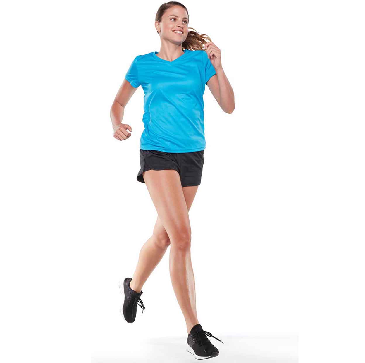 Running wearing the Augusta Girls Youth Wayfarer Shorts.