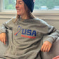 Girl wearing the USA Field Hockey Unisex Crewneck Sweatshirt