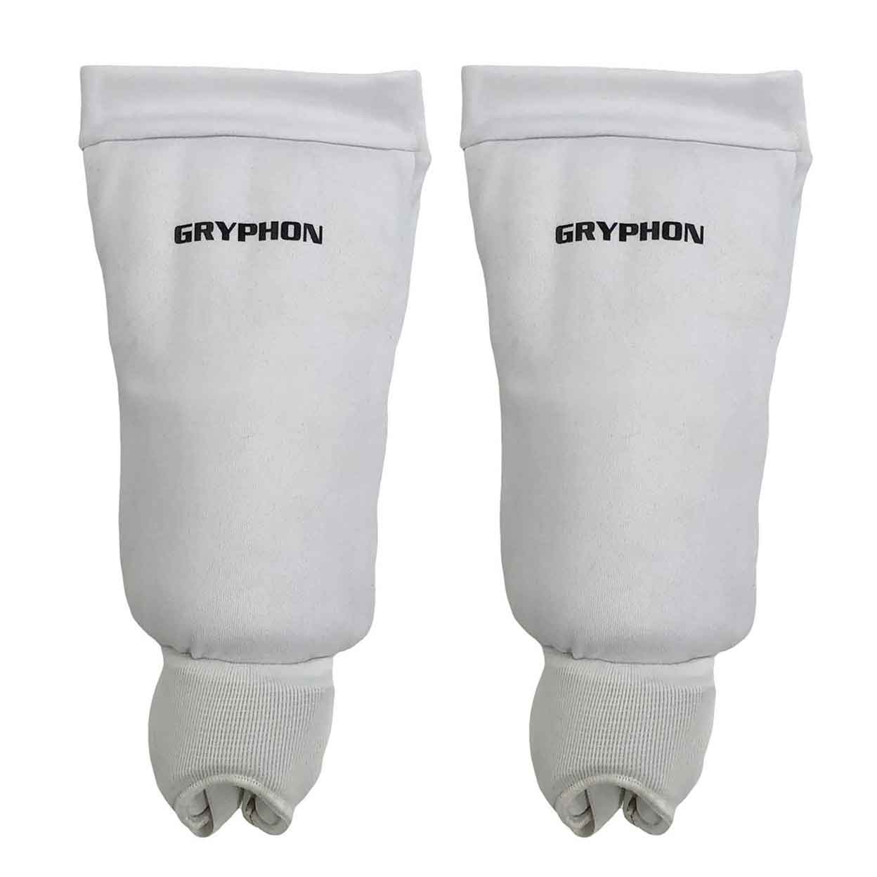 a white pair of Gryphon Elite Field Hockey Sockguard