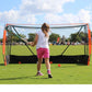 young girl practicing with the Bownet Youth Field Hockey Net