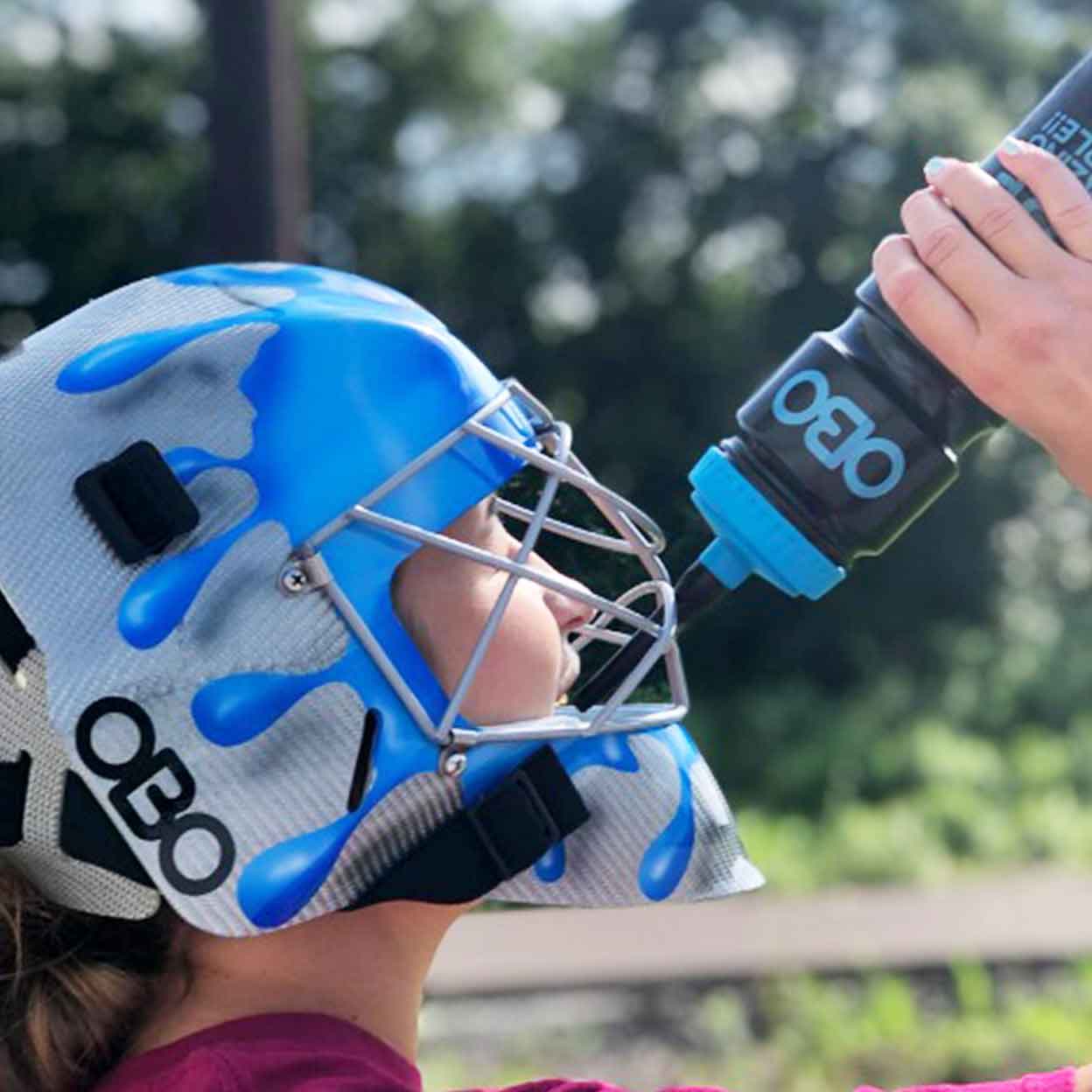 Goalie drinking ou tof the OBO Waterbottle